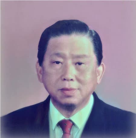 何既明